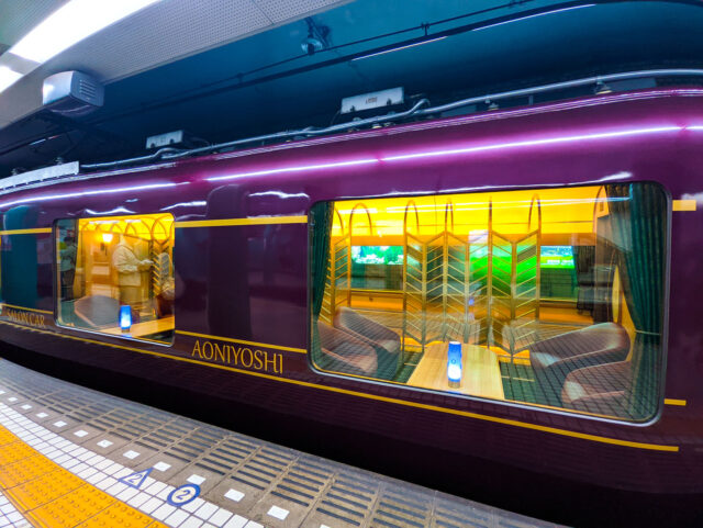 Step into elegance aboard the Kintetsu Aoniyoshi limited express, where the salon car’s cozy seating and warm ambiance turn your Kansai journey into a refined travel experience.